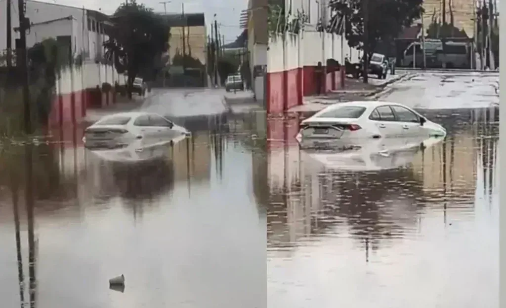 Chuva intensa alaga rua em Cuiabá e carro fica ilhado em bairro e acende alerta em destaque